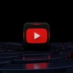 a red play button on a black background